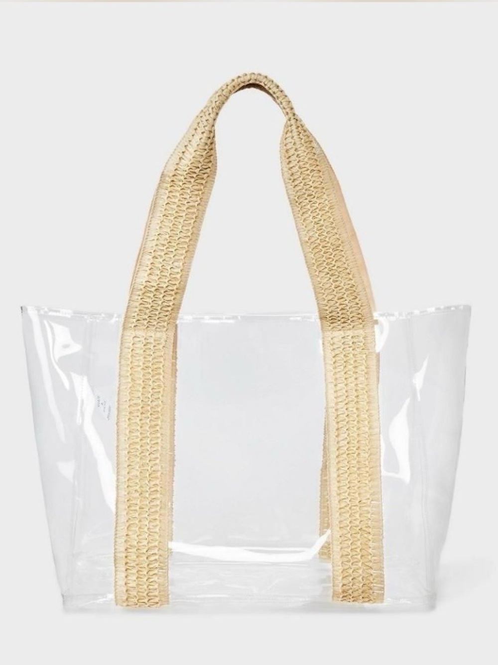 Shade & Shore clear tote handbag features woven straw-like handles